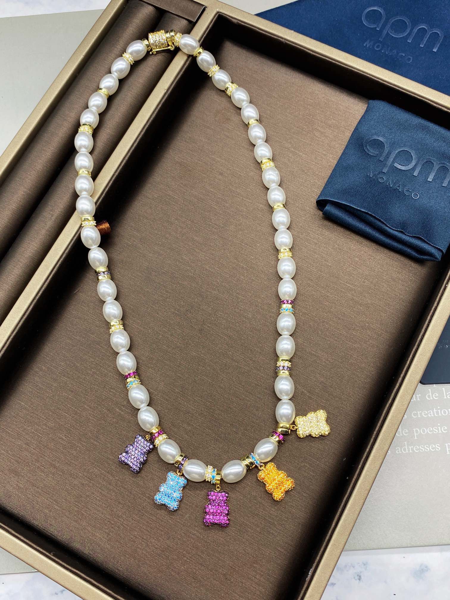 APM Monaco Pearl and Crystal Bear Charm Necklace